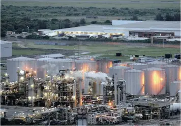  ?? PHOTO: REUTERS ?? The SA Petroleum Refinery in Durban. The writer says refinery profits have fallen along with the oil price, making them even less attractive purchases than they were.