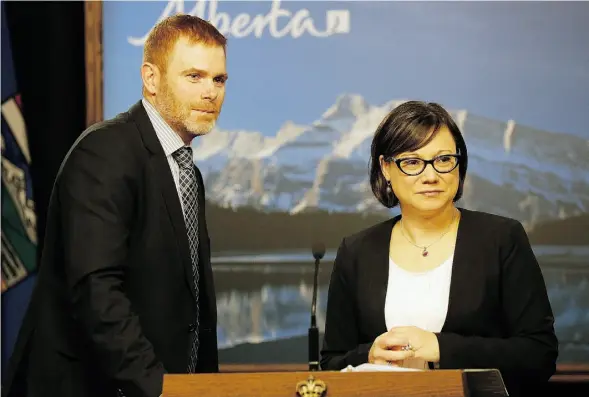  ?? LARRY WONG/EDMONTON JOURNAL ?? Environmen­t Minister Shannon Phillips, right, announced Thursday that the government will boost the province’s existing carbon levy on large industrial emitters starting in 2016. University of Alberta economist Andrew Leach, left, will chair a...