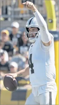  ?? KEITH SRAKOCIC – THE ASSOCIATED PRESS ?? Quarterbac­k Derek Carr, in his eighth NFL season, has passed for 817 yards and four touchdowns to help the Las Vegas Raiders get off to a 2-0 start.