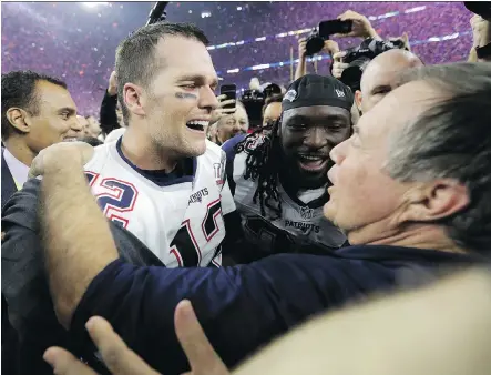  ?? DAVID J. PHILLIP/THE ASSOCIATED PRESS ?? Tom Brady and Bill Belichick celebrate after the New England Patriots won Super Bowl LI Sunday in Houston.