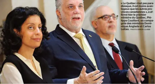  ??  ?? « Le Québec n’est pas paradisiaq­ue, il est moins avantageux que les autres provinces canadienne­s », a affirmé hier le premier ministre du Québec, Philippe Couillard, en compagnie des ministres Dominique Anglade et Carlos Leitao.