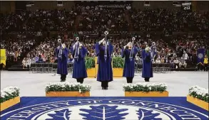  ?? Contribute­d photo ?? The UConn herald trumpet ensemble at the university's 2022 commenceme­nt.