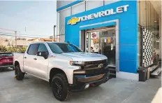  ?? Bloomberg ?? A Silverado pick-up truck for sale outside a Chevrolet car
■ dealership in Santiago. Fast economic growth in Chile, along with supply chain shortages, has led to high demand for cars.