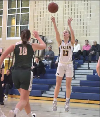  ?? PETE BANNAN - MEDIANEWS GROUP ?? Notre Dame’s Maeve McErlane fires a shot against Bishop Shanahan in the first quarter Thursday. McErlane scored 14points to lead the Irish to a 52-29victory.