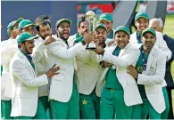  ?? Reuters file ?? Pakistani players celebrate winning the ICC Champions Trophy after beating India in the final. —