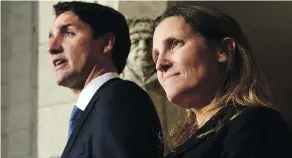  ?? SEAN KILPATRICK / THE CANADIAN PRESS ?? Prime Minister Justin Trudeau, seen here with Foreign Minister Chrystia Freeland last year, cited propaganda attacks on Freeland as evidence of Kremlin mischief.