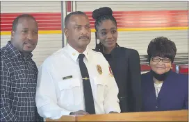  ?? PETE BANNAN - MEDIANEWS GROUP ?? Upper Darby’s new fire chief, Derrick Sawyer, with his son Derrick Sawyer II, wife Suzette and mother Frances Kelley.