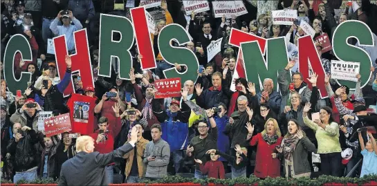  ?? [JONATHAN BACHMAN/THE ASSOCIATED PRESS] ?? President Donald Trump waves to supporters Friday during a rally in Pensacola, Fla.