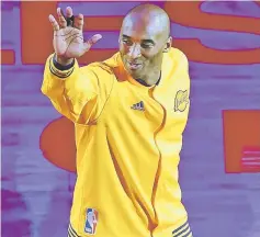  ??  ?? Bryant waves to fans as he takes the court for his last game for the Los Angeles Lakers against Utah Jazz in their season-ending NBA western division matchup in Los Angeles in this April 13, 2016 file photo. — AFP photo