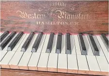  ?? MARK MCNEIL ?? A square grand piano made by C.L. Thomas Western Pianoforte Manufactor­y of Hamilton that is owned by Hamilton artifact collector Dennis Missett. The company made pianos in Hamilton from 1856-1893 and employed 30 people.