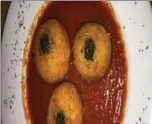  ?? ALANA HUDSON, SPECIAL TO THE HAMILTON SPECTATOR ?? On the arancini, the sauce was made in-house, with tomatoes that taste fresh from the garden..