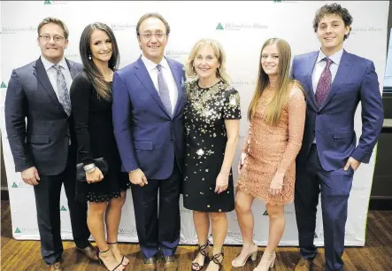  ?? PHOTOS: BILL BROOKS ?? Lorenzo Donadeo, third from left, was one of four legendary entreprene­urs inducted into the Alberta Business Hall of Fame for Southern Alberta. Joining Donadeo, from left, are proud family members, son Franco, daughter -in-law Hayley, wife Donna, Haley Pickard and son Marco Donadeo.