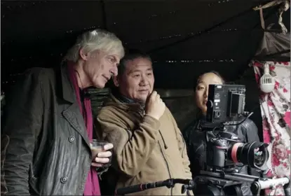  ?? PHOTOS PROVIDED TO CHINA DAILY Searching for Kung Fu. ?? Laurence Brahm works with the film crew on his latest documentar­y,