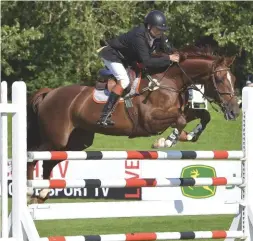  ??  ?? Barry Drea and Okehurst Miss Mexico land the 1.20m amateur final