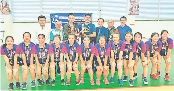  ??  ?? Ling (third left) with other guests and officials pose with the girls champion of Miri Division Under 18 (Secondary School) Volleyball Tournament,