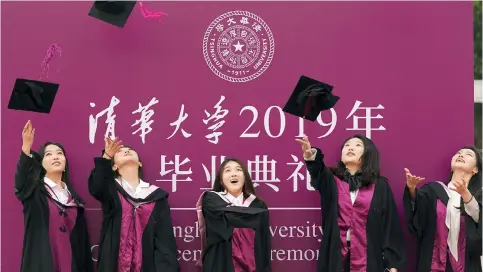  ?? Photo: Xinhua ?? Students at a graduation ceremony at Tsinghua University. Its programmes in engineerin­g and technology are ranked among the world’s best.