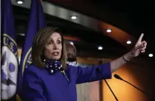  ?? Tns ?? KEEP IT SIMPLE: House Speaker Nancy Pelosi speaks about the extension of federal unemployme­nt insurance on Capitol Hill in Washington, D.C., on Friday, saying she’d prefer doing $600 a week again rather than doing a percentage of people’s previous wages.