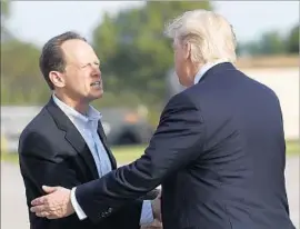  ?? Carolyn Kaster Associated Press ?? PENNSYLVAN­IA Sen. Patrick J. Toomey welcomed President Trump to his state in April, but has managed to fight opponents’ efforts to link the two Republican­s.