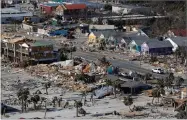  ?? AP PHOTO BY GERALD HERBERT ?? This Oct. 12, 2018 aerial file photo shows devastatio­n from Hurricane Michael over Mexico Beach, Fla.