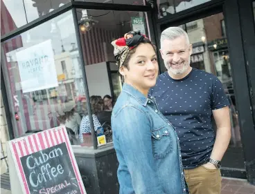  ?? TYLER ANDERSON / NATIONAL POST ?? Monica Mustelier and Joshua English at their pop-up shop Little Havana Café in the Junction neighbourh­ood in Toronto. “It’s a great way for new businesses to test an area and clientele,” English says. “We get to have our own space with less headaches.”