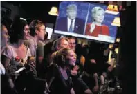  ??  ?? American TV viewers tuned in avidly to the debate