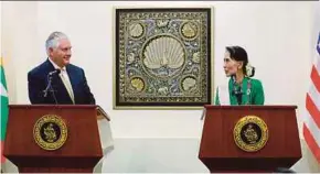  ?? EPA PIC ?? United States Secretary of State Rex Tillerson and Myanmar State Counsellor Aung San Suu Kyi at a joint press conference after their meeting at the Foreign Affairs Ministry in Naypyidaw, Myanmar, yesterday.