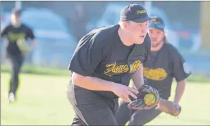  ?? JASON MALLOY/THE GUARDIAN ?? Charlottet­own John Brown Grille Fawcetts third baseman Chris Arsenault fields a ground ball and prepares to throw to first base for the out Thursday during an exhibition game with the Re/Max Ravens.