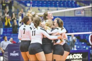  ?? Special to The Sentinel-Record/Aaron Brewer ?? WE ARE THE CHAMPIONS: Harding’s volleyball team celebrates winning the Great American Conference Volleyball Championsh­ips final Saturday at Bank OZK Arena in four sets over Henderson State.