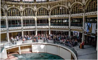  ?? TOM GILLIAM / STAFF ?? More than 120 people gathered in the rotunda of the Dayton Arcade on Wednesday for an announceme­nt from the state on historic tax credits. The arcade was awarded $5 million in incentives.