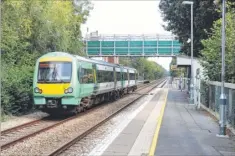  ??  ?? Cllr Peter Davison; right, a temporary footbridge at Ham Street station