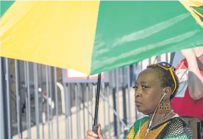  ?? Picture: Getty. ?? A demonstrat­or wears ‘black lives matter’ earrings during a protest in support of the Windrush generation in Windrush Square, Brixton, yesterday.