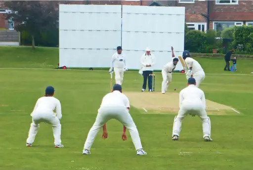  ?? ?? ●●Marple’s Alex Pannell faces up to Bollington’s opening bowler Haroon Cheema last Saturday. Marple’s centurion with 107, Andrew Hall, is pictured at the non striker’s end