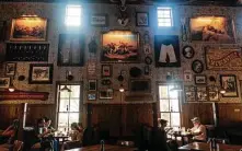  ??  ?? Guest enjoy breakfast amid historical memorabili­a — and air conditioni­ng — at The Ranch at Death Valley.