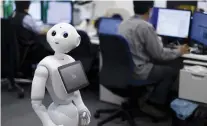  ??  ?? Researcher­s say robots and people will work more closely together than ever before.