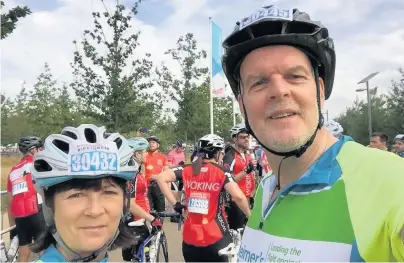  ??  ?? ●●Jo Gregory with her late husband Mike as they prepare to take on Ride London in 2015