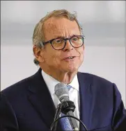  ?? TY GREENLEES / STAFF ?? Ohio AG Mike DeWine, the GOP candidate for governor, is teaming up with the Bureau of Workers’ Compensati­on to provide grants of up to $40,000 to police agencies to purchase protective vests.