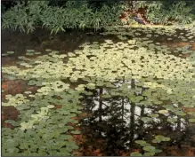  ?? Courtesy of Greg Thompson Fine Art ?? Charles Harrington’s Blue Heron and Lily Pads shows the artist’s trademark style.