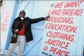  ?? ARIC CRABB — BAY AREA NEWS GROUP ?? Frances Moore with artwork at Driver Plaza in Oakland on Wednesday. “Art is medicine,” she said.