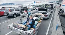  ?? Photo: MAARTEN HOLL/FAIRFAX NZ ?? Bow door blues: Saxophonis­t Robert Goldsmith had to provide his own entertainm­ent as he waited for the delayed Kaitaki to sail from Wellington.