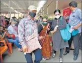  ??  ?? Citizens from the 45+ age group on their way to getting vaccinated in Goregaon on Wednesday.