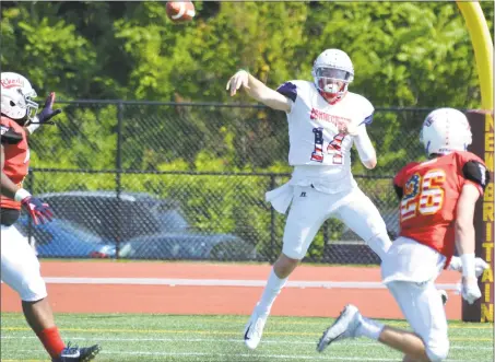  ?? Pete Paguaga / Hearst Connecticu­t Media ?? Connecticu­t’s Kyle Zajack throws against Rhode Island during Saturday’s Governor’s Cup in New Britain.