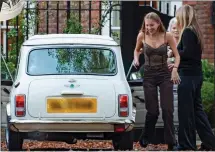  ??  ?? VINTAGE MODEL: Lila gets a white Mini for her 18th birthday, left, seemingly the same car Kate, above, had in 2001