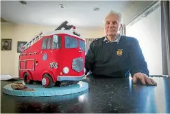  ??  ?? Dennis with his 1959 Dennis fire truck cake, which was presented along with his 50-year service medals by the Eltham brigade.