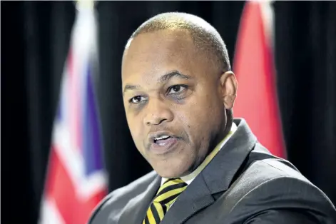  ?? FRANK GUNN/THE CANADIAN PRESS ?? Justice Michael Tulloch releases his recommenda­tions on how to enhance oversight of policing in the province at a news conference in Toronto on April 6. The Liberal government has appointed Tulloch to conduct a review of the police practice of carding.