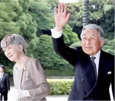  ??  ?? Akihito and Empress Michiko arrive at the Imperial Palace before welcoming Vietnam’s President Tran Dai Quang and his wife Nguyen Thi Hien in Tokyo in this file photo. — Reuters photo