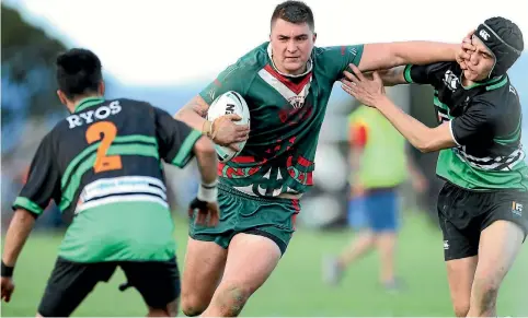  ?? PHOTO: CAMERON BURNELL/STUFF ?? Chevy Graham carts the ball up for Whiti Te Ra in the Wellington premiershi­p final against Wainuiomat­a.