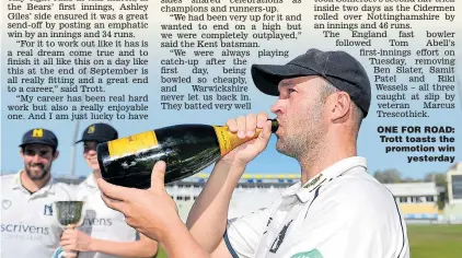  ??  ?? ONE FOR ROAD: Trott toasts the promotion win yesterday