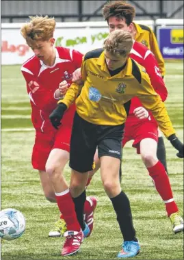  ?? FM4174980 Buy this picture from kentonline.co.uk ?? Maidstone under-15s’ Michael Mahoney battles for the ball with Tunbridge Wells