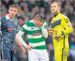  ??  ?? Celtic’s Leigh Griffiths is disconsola­te after County keeper Scott Fox had saved his penalty attempt in the 2016 semi-final that also saw Efe Ambrose (inset) take the long walk after being shown a red card