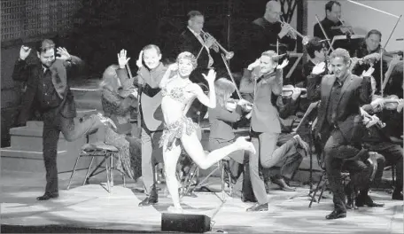  ?? Cory Weaver ?? DANCER Erin Moore adds some razzle-dazzle to the San Francisco Symphony’s performanc­e of George Antheil’s “A Jazz Symphony.”